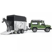 Bruder Vehicle Land Rover with horse trailer and figurine
