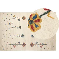 Beliani Dywan wełniany ze wzorem w kwiaty 140 x 200 cm beżowy Husunlu Lumarko 383833 Bel