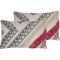 Beliani Lumarko 2 bawełniane poduszki dekoracyjne geometryczny wzór 30 x 50 cm wielokolorowe Betula 303218 Bel