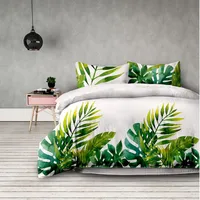 Decoking Kokvilnas gultasveļa 200X220 Averi Makia Tropical Dream baltas zaļas monsteras palmu lapas 5000596